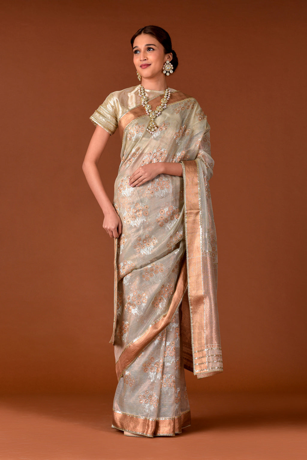 Kota Tissue Saree – Grey | Guldasta Placement Embroidery with Badla, Meena & Sequin Highlights | Rose Gold Zari Border | Women’s Luxury Festive Saree
