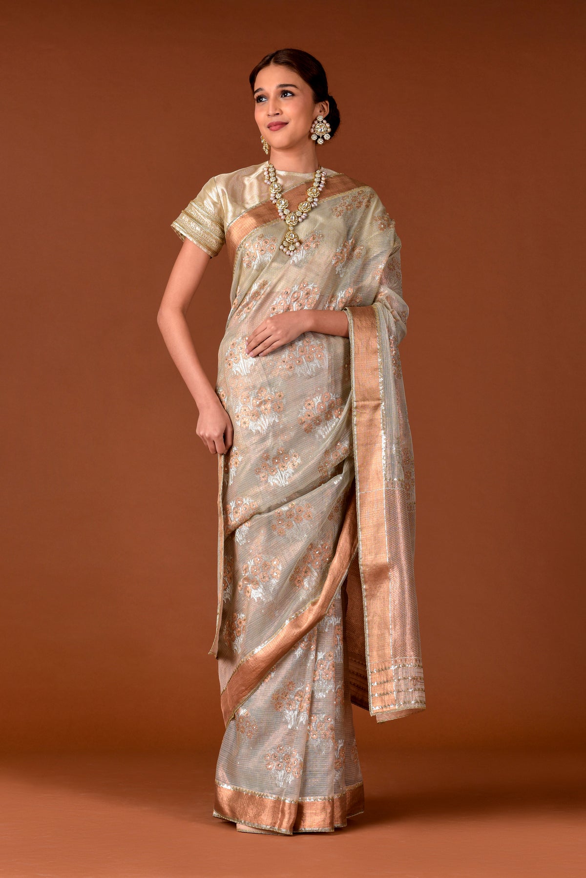 Kota Tissue Saree – Grey | Guldasta Placement Embroidery with Badla, Meena & Sequin Highlights | Rose Gold Zari Border | Women’s Luxury Festive Saree