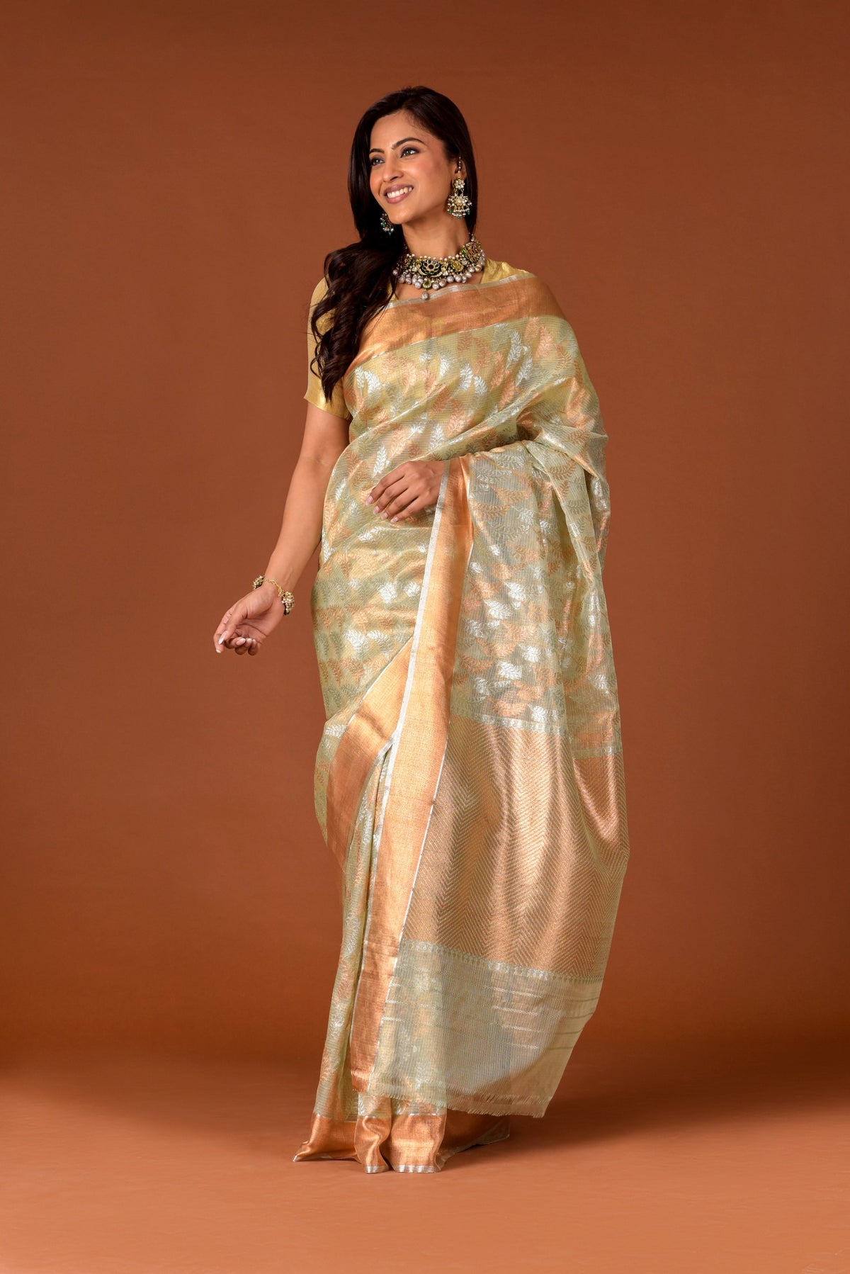 Kota Tissue Saree – Pista Green | Mehaksha All-Over Silver & Gold Leaf Jaal Weave | Rose Gold Chevron Zari Border | Handwoven Luxury Festive Saree