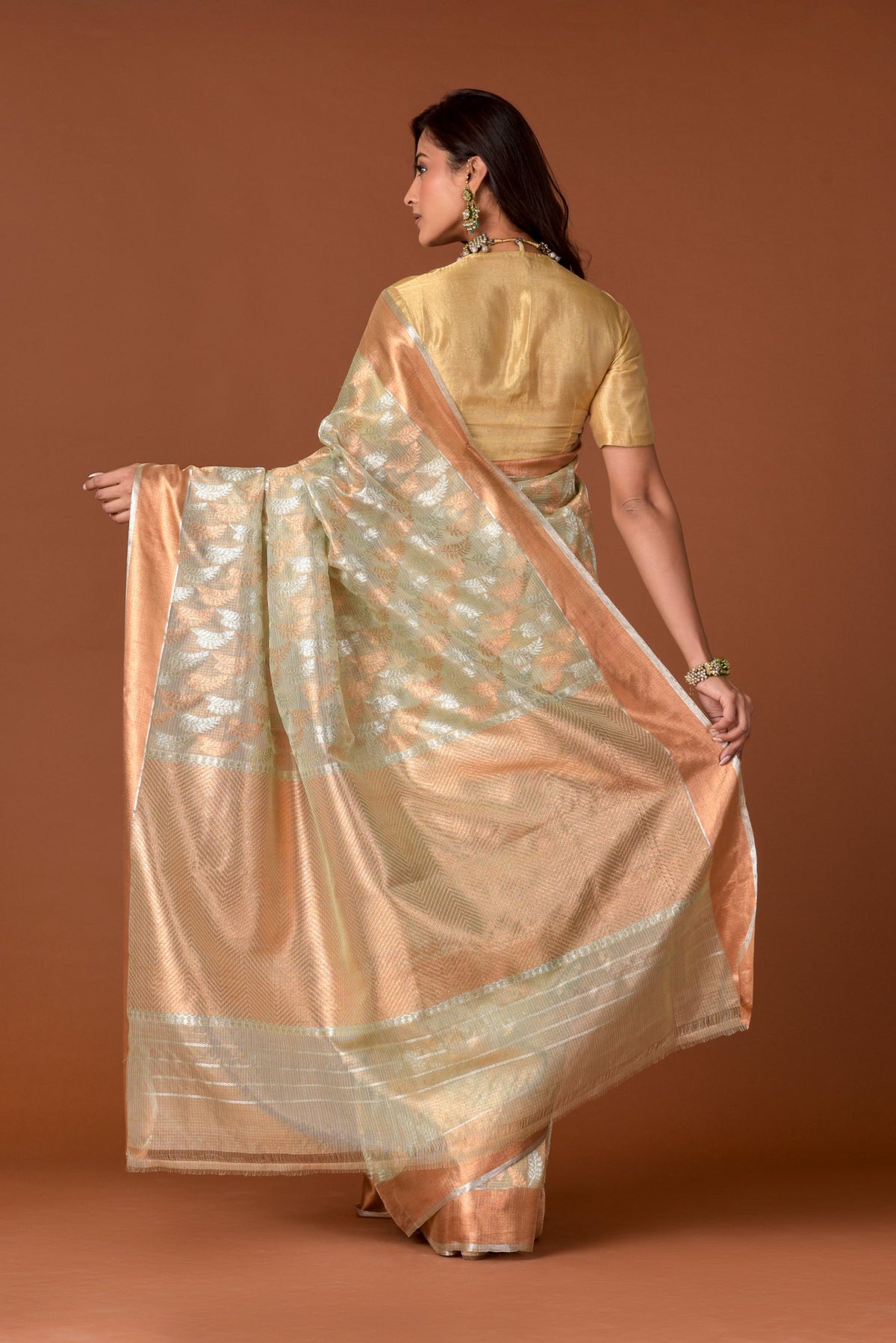 Kota Tissue Saree – Pista Green | Mehaksha All-Over Silver & Gold Leaf Jaal Weave | Rose Gold Chevron Zari Border | Handwoven Luxury Festive Saree