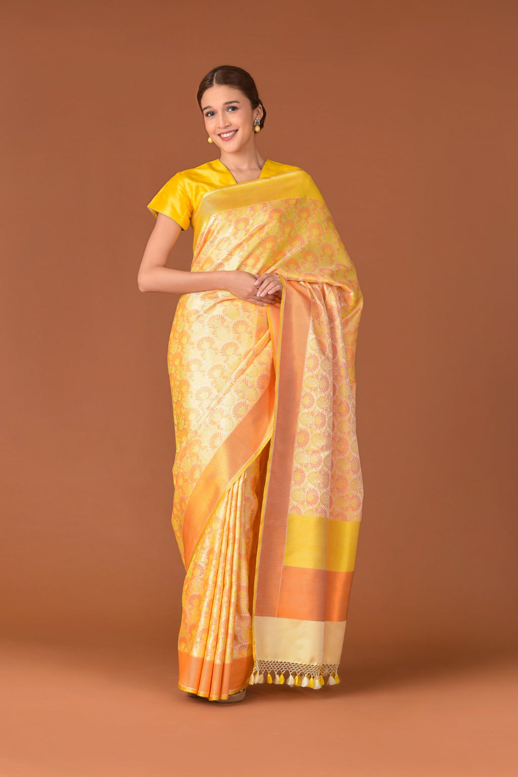Banaras Satin Silk Saree – Cream Yellow | All-Over Lotus Jaal in Multicolour Resham | Deep Orange Satin Border | Handwoven Banarasi Festive Saree