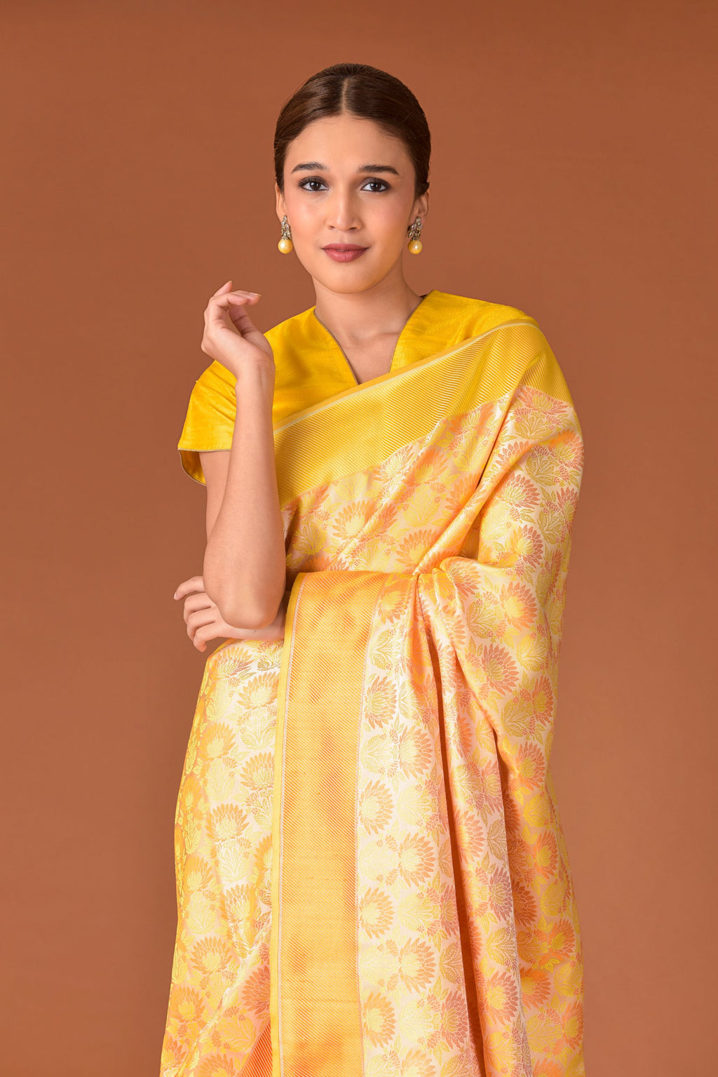 Banaras Satin Silk Saree – Cream Yellow | All-Over Lotus Jaal in Multicolour Resham | Deep Orange Satin Border | Handwoven Banarasi Festive Saree