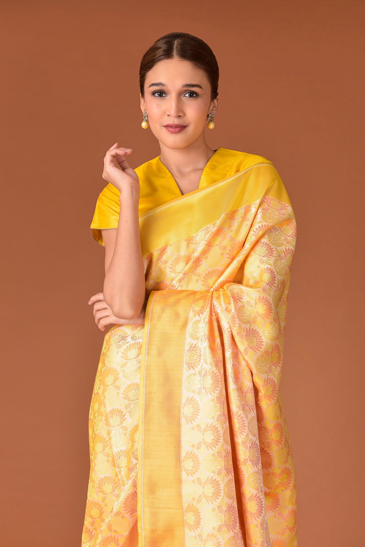 Banaras Satin Silk Saree – Cream Yellow | All-Over Lotus Jaal in Multicolour Resham | Deep Orange Satin Border | Handwoven Banarasi Festive Saree