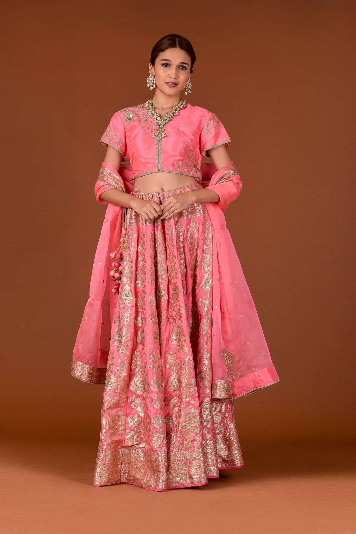 Banaras Woven Rose Jaal Lehenga Set – Pink | All-Over Gold Zari Rose & Floral Jaal with Sequin Highlights | Embroidered Dupion Silk Blouse & Organza Dupatta | Handwoven Banarasi Bridal Lehenga