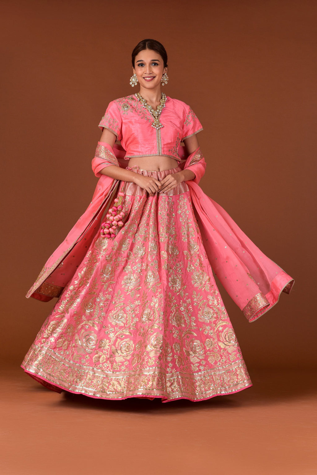 Banaras Woven Rose Jaal Lehenga Set – Pink | All-Over Gold Zari Rose & Floral Jaal with Sequin Highlights | Embroidered Dupion Silk Blouse & Organza Dupatta | Handwoven Banarasi Bridal Lehenga