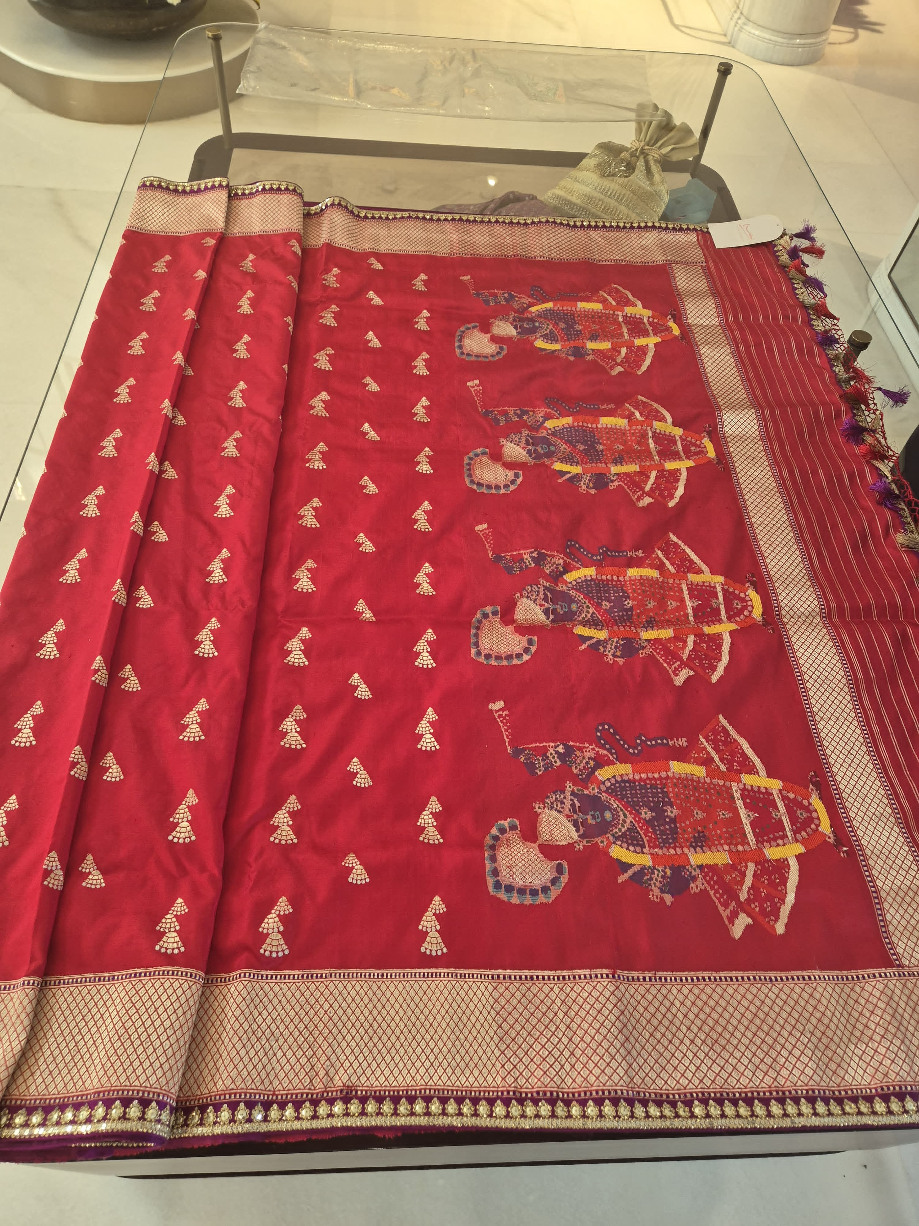 Shreenath Ji palla with all over Buti Red Saree